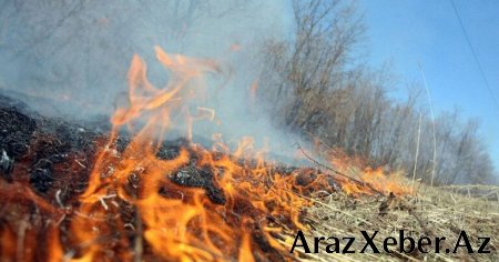 Hövsanda açıq ərazi YANIR